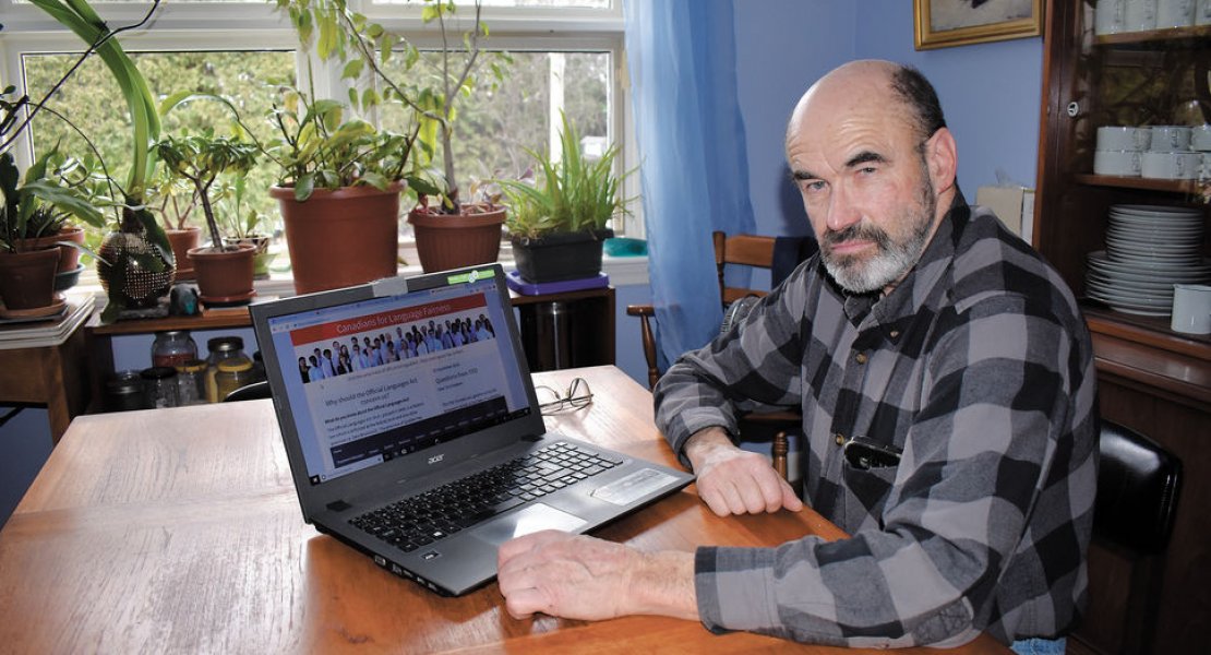 Jean-Serge Brisson on Laptop
